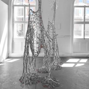 Reciprocal Space, beverage cartons, tape, gesso, 280 x 180 x 90 cm.
