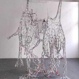 Reciprocal Space, beverage cartons, tape, gesso, 280 x 180 x 90 cm.